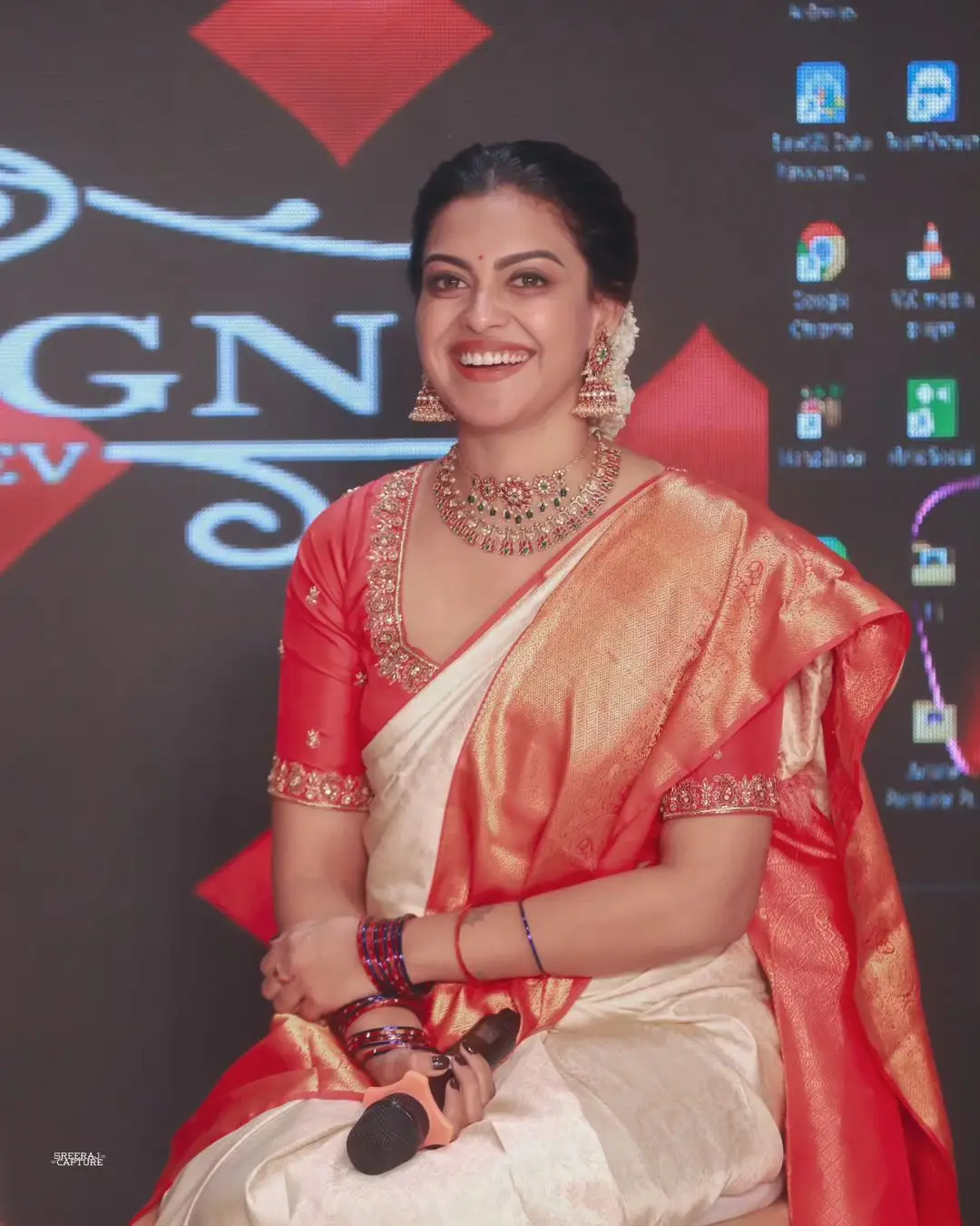 Anusree Nair Wearing Beautiful Earrings Jewellery White Saree Orange Blouse